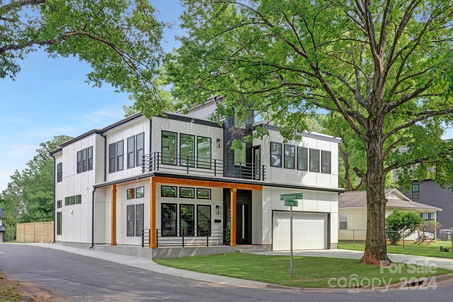 Experience luxury living with this brand-new construction in the desired Belmont neighborhood, just minutes from Plaza Midwood and Uptown. This home decked out in high end finishes, including ZLINE appliances, quartz countertops and backsplash, elegant light fixtures, and two stunning glass-encased staircases. The open floor plan, along with the freestanding bioethanol fireplace, effortlessly creates an welcoming ambiance. And there's more - the sunken sunroom is a standout feature with its large bi-fold doors that seamlessly open up to the back patio, offering a perfect indoor-outdoor flow for gatherings and relaxation. Upstairs, you'll find four bedrooms, an office, and an open loft area, providing ample space for work, relaxation, and rest. Hang out in style on the private balcony off the spacious primary bedroom. The primary bedroom also features a generously sized walk-in closet and an en-suite bathroom. Don’t miss out on this chance to own the home of everyones dreams!