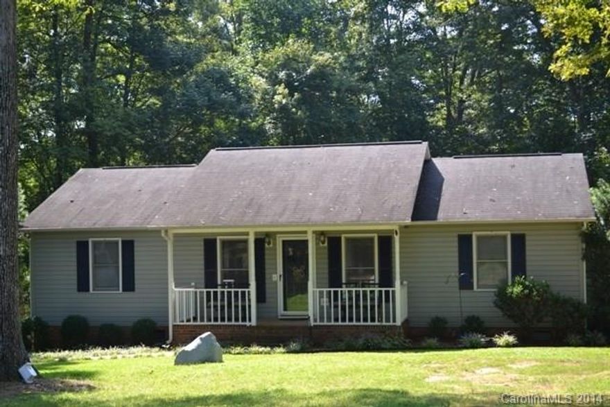 Adorable ranch style home with rocking chair front porch! Open floorplan offers spacious great room, dining room area. Large kitchen with breakfast bar. Split bedroom plan, HUGE master bedroom! Oversized .5 acre lot featured deck and storage building. Convenient to shopping, restaurants and I-77! A Must See!