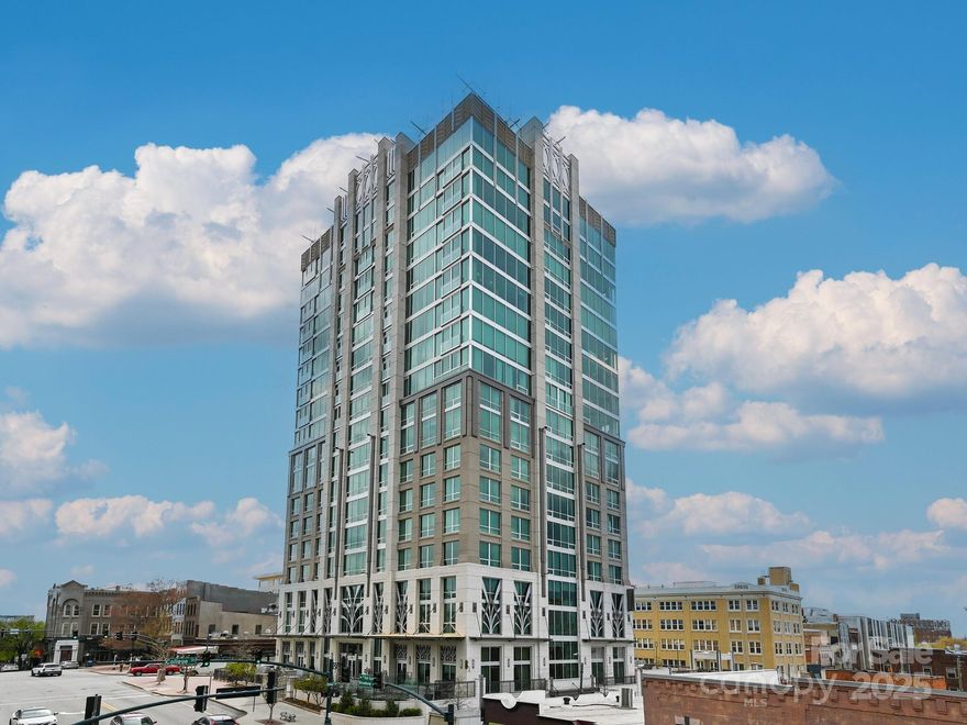 PRICE REDUCTION! This stunning residence offers the best of downtown living with a touch of mountain charm. Situated in the heart of the city, the home showcases expansive downtown views while maintaining a serene, mountain-inspired feel. French doors open to refreshing mountain air, seamlessly blending indoor and outdoor living.
The spacious open floor plan is enhanced by soaring 10’ windows that flood the interior with natural light. Residents enjoy premier amenities, including a state-of-the-art fitness center with updated equipment, an attached garage with an allocated parking space, and a climate-controlled storage unit.
The building itself fosters a true sense of community with on-site restaurants, outdoor fire pits perfect for gathering, and top-notch security for peace of mind. Balancing luxury with a welcoming, hometown feel, this property offers the perfect combination of comfort, convenience, and lifestyle.