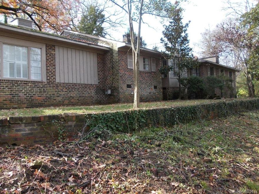 This unique older home features 5 bedrooms, 3.5 bathrooms and over 3700 square feet.  Classic style ranch has hardwoods throughout, formal living room, den/dining, study, breakfast area, sunroom and split bedrooms.  Master has plenty of closet space and built in dresser.  2 Jack and Jill baths separate 4 secondary bedrooms.  All bedroom have good closet space.  This home is located on over an acre, semi-private lot just off Wendover and Randolph Rd.  Close to Uptown, Hwy 74 and shops/restaurants