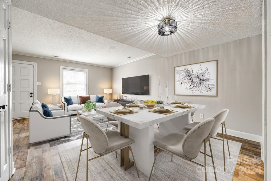 BRAND NEW LVP FLOORING with no increase in price! Move-in ready for a new owner! Perfectly located in the center of all the Ebenezer area has to offer! Enjoy low maintenance living in this cozy condo, with laundry and half bath  conveniently placed on main level opposite the comfortable living area, and attractive kitchen. Ample dining space to sit and enjoy the sunlight coming in from the fully fenced private patio. Two spacious bedrooms and two full baths on the upper level. The primary features customized closet shelving and private bath with walk-in shower. Lower level has been freshly painted and all kitchen appliances to convey at no value. Seller is not aware of any maintenance issues with the property but would like to sell AS-IS.