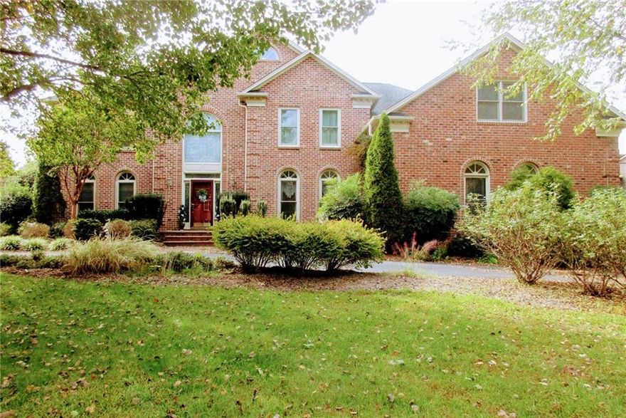 This two story all brick traditional is priced $60,800 below tax value. The home needs some updating and your personal touch but has excellent bones!  A prelisting home inspection has already been done and available to prospective buyer.  There are spacious five bedrooms, four full baths, bonus room and work out room. The kitchen would make anyone who entertains or cooks for their family happy! The kitchen and family room opens up to a huge covered deck offering additional gathering space. This level also offers office or formal living room, dining room, family room with fireplace, updated kitchen with granite countertops, breakfast, salad bar, pantry, laundry and guest bedroom, and full bath. Upstairs offers master plus 3 bedrooms, bonus room and work out room. As if that is not enough, community amenities include pool, club house, and deeded boat slip.