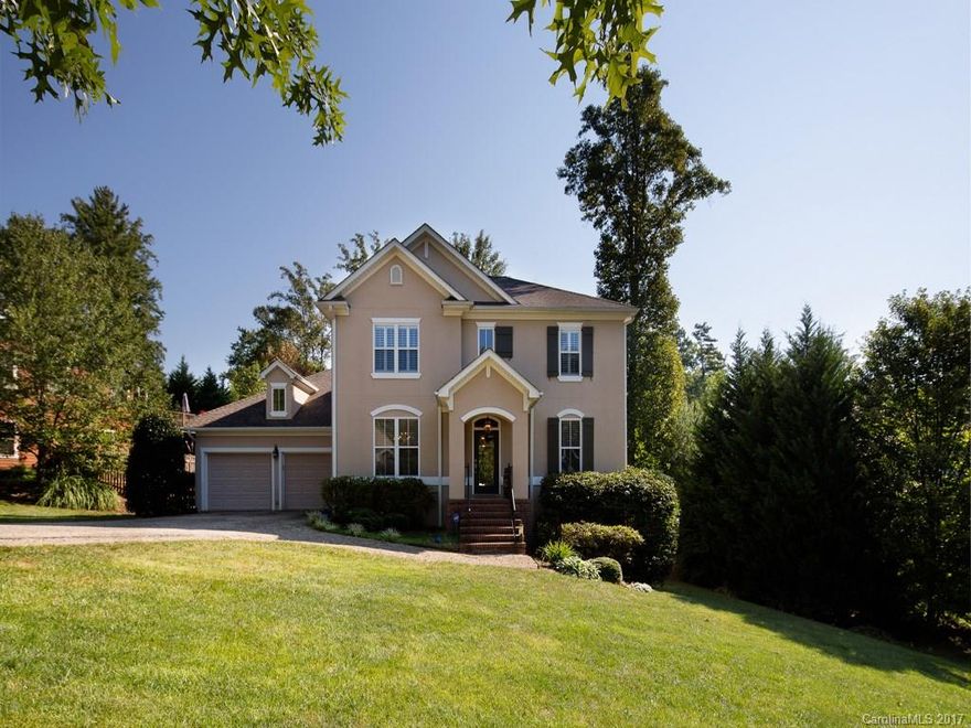 Beautiful upscale home in great neighborhood setting! Well appointed open kitchen, master on main, 2nd main level bedroom with full bath, distressed walnut floors, slate tile, finished lower level with rec room, bedroom and bath. Close to lake, playgrounds, parks, clubhouse, tennis and everything else Biltmore Lake has to offer!
