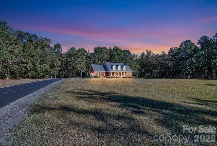 Welcome to your private 2.5-acre full-brick retreat offering over 3,000 square feet of space, privacy, and flexibility — all just minutes from Pageland and Lancaster.

This spacious 4-bedroom, 3-bath home was designed for both everyday living and entertaining, featuring a flowing floor plan, oversized living areas, and abundant natural light throughout. The large kitchen provides generous cabinet space and opens into the main living area, creating the perfect gathering space for family and guests.

The primary suite offers a quiet escape with ample room, a private bath, and walk-in closet. Additional bedrooms provide flexibility for a home office, guest space, or multigenerational living.

Step outside and enjoy true country living with 2.5 private acres, a long driveway, and a screened porch ideal for morning coffee or evening relaxation. The full brick exterior, two-car garage, and expansive yard offer both durability and room to grow — with space for a garden, workshop, or outdoor entertaining area.

?? Full brick home
?? 3,000+ sq ft
?? 2.5 private acres
?? Screened porch
?? Two-car garage
?? No HOA
?? Flexible layout for work-from-home or guests

If you’ve been searching for space, privacy, and value with convenient access to Lancaster and surrounding areas, this property delivers.