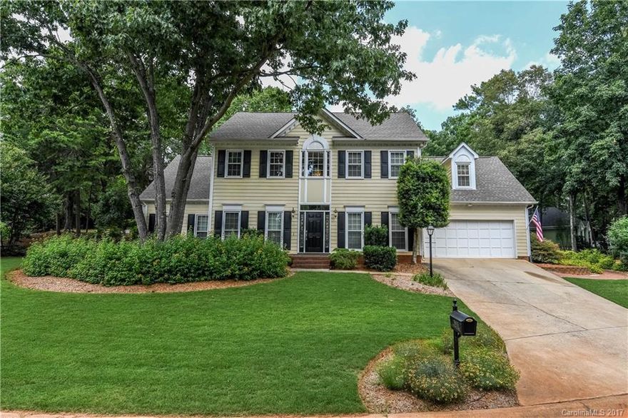 Fabulous 2 sty beauty on Tega Cay Peninsula w/5/3.5 and bonus. Seasonal water views. Short walk/ride to Windjammer beach prk. Lrg formals. Tiled GR open to Cook's k'chen. Gas range, 3 ovens. Butlers Pantry. Kit org. ctr. Main MBR-updated luxury BA, oversized shower, heated flrs. Marble counters w/fossil flecks. 4 BR/2 BA up. Bonus up. Backyard oasis. Nature lovers paradise. Dining patio. Cottage shed. Fire pit ready for new owner completion. Almost 1/2 ac. Irrigation. Home sits lot beautifully.
