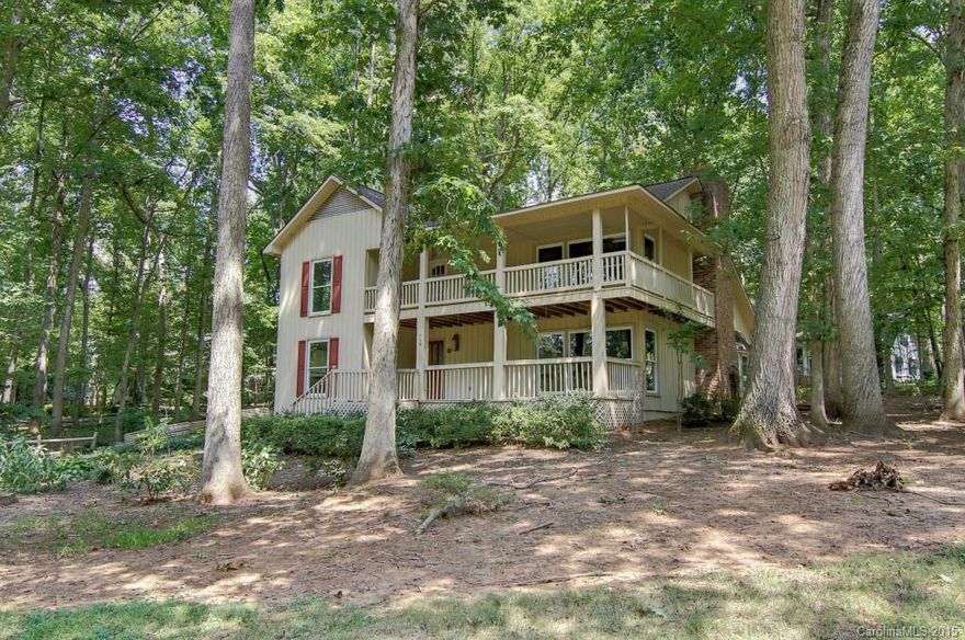 The style, character, and location you have been looking for in a home has finally arrived! Come home to this classic, European-styled gem with high ceilings, a stone fireplace, durable flooring, 4 bedrooms , 2.5 baths, and a loft! The double front porches are ideal for relaxing on those quiet evenings. This gated waterfront community includes a club house, golf, pool, tennis, recreation area and more! USDA Eligible!!