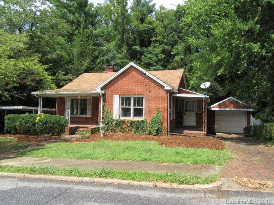 This beautiful brick home has it all: lots of charm, a great location, and best of all, a great price! This 2 bedroom, 1 bath home has a large kitchen with a unique built-in pantry, walk-in closet in the master bedroom, and dazzling hardwood floors that have been newly refinished. The backyard is a lush, private oasis, and the detached garage is complete with a large workshop underneath. The unfinished basement provides lots of additional space and is a blank canvas of possibilities. Just minutes from downtown Morganton, and a short walk from Forest Hill Elementary. Son't miss out on this affordable home in a prime location.