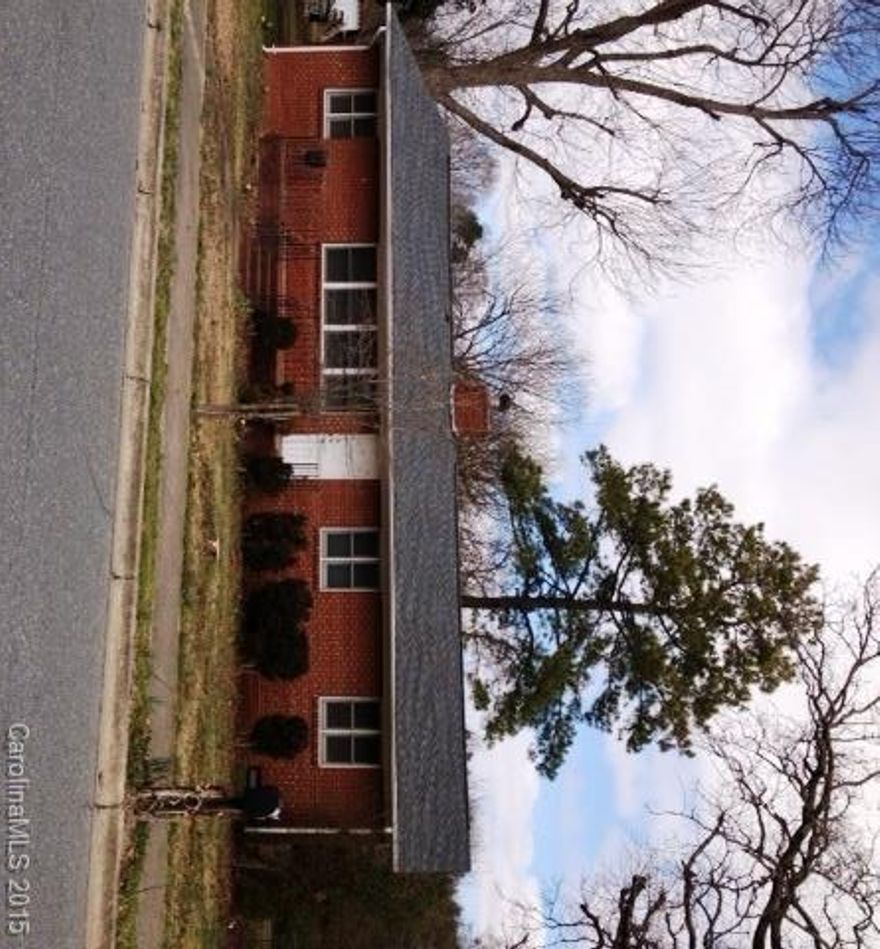 Walk to Wingate College or Elementary School from this 4BR, 2.5 BA brick ranch on nearly 1 acre! Enjoy a large 249-sqft deck + a front porch bordered by wrought-iron railings.  Needs some updating but much potential and space for the money. An additional bedroom and office added to original structure in 1993. Both roof and heating system new in 2007.  Small bath off den is not counted in heated area nor in number of baths.  Extra large lot Convenient to restaurants and shopping.