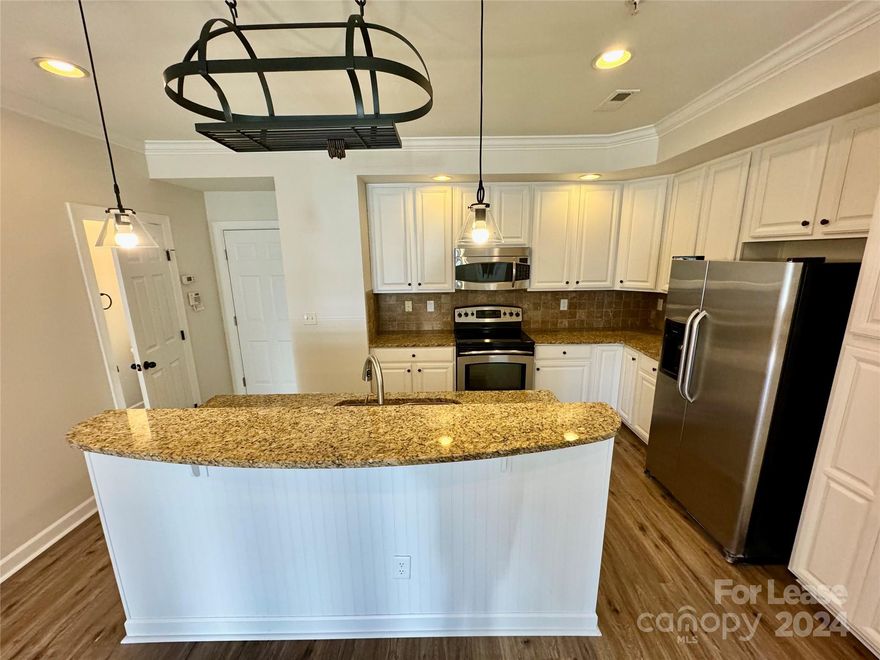 This fabulous condo is walking distance to everything South End has to offer and to Uptown with easy access to the light rail! Unit is now vacant and move in ready! Upon entering, hardwood floors welcome you throughout the main level. Kitchen has stainless steel appliances, granite countertops, and abundant cabinetry. Bedrooms and two bathrooms on second level with Master bedroom opening to deck. The laundry room with washer and dryer is on the second level. This home offers surround sound throughout and plantation shutters on all windows as well! Water/Trash Included. Call today to set your appointment.