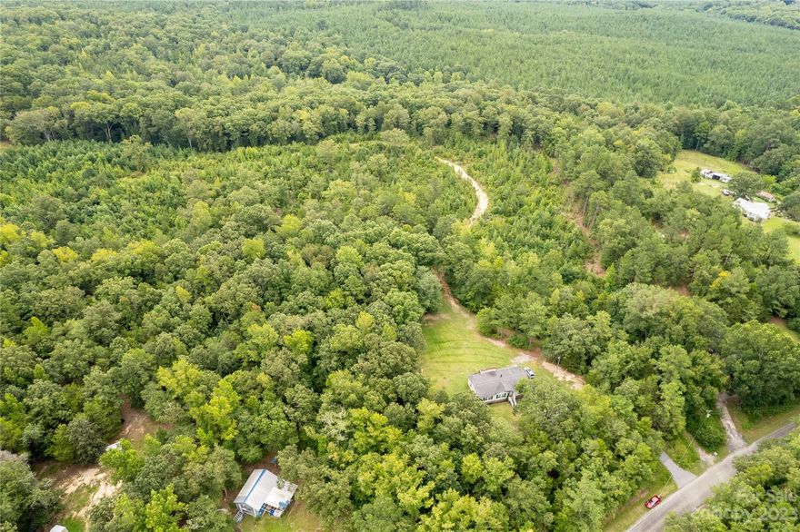 The possibilities are many with this large 18 acre tract. Conveniently located within minutes of I-77 and the new Whitewater center. Just a short drive from Chester, Rock Hill, and Gt. Falls. Want more land - there's opportunity to purchase additional land with neighboring tract of land that is listed for sale as well.