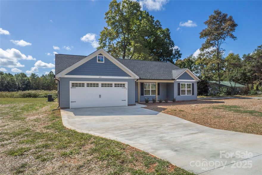 Brand new home located on Zoo Parkway in Asheboro. Beautiful spacious open floor plan with upgraded finishes. Kitchen and bathroom feature upgraded cabinets that are solid wood and granite countertops throughout. Vinyl plank flooring is durable and great for any buyer with pets. Custom tile shower in master with glass shower doors. Floored attic storage space above the garage with easy access. Large lot in convenient location just a few minutes away from everything you need but still has a country feel.