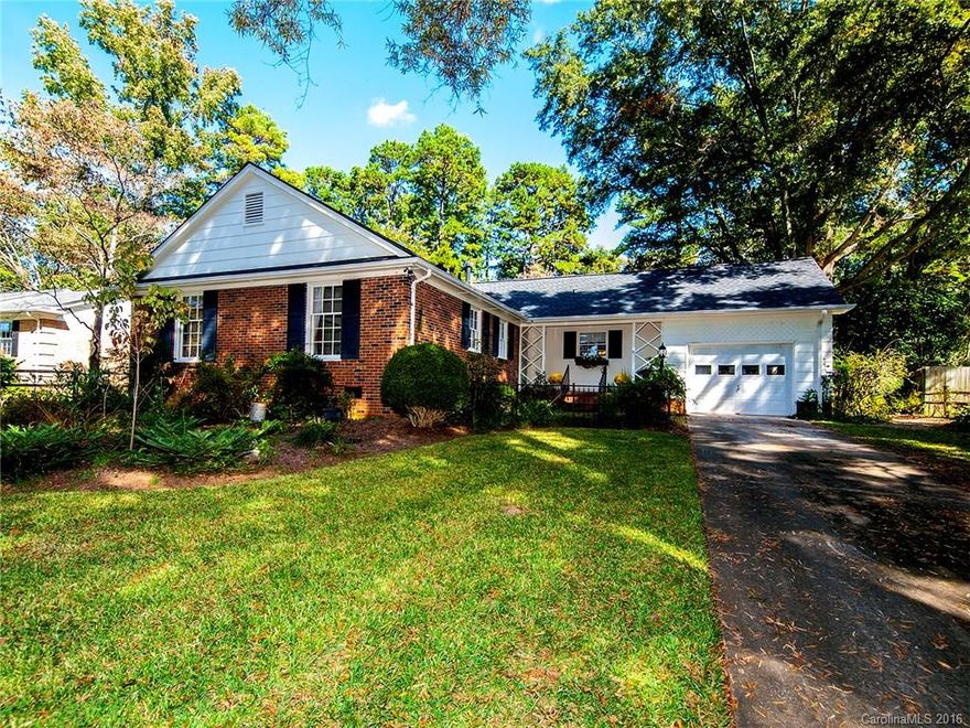 Hard to find 4 BR brick ranch with garage on almost half acre lot.  Hardwood flooring throughout, including baths & kitchen. Formal living & dining room with mirrored wall and large picture window. Spacious kitchen w/ large center island & neutral decor.  Breakfast and kitchen opens to family room featuring masonry gas log fireplace.  Master suite has large closet and updated vanity with solid surface counter. The backyard is a "Natural Wonderland" with many varieties of annuals and perennials.