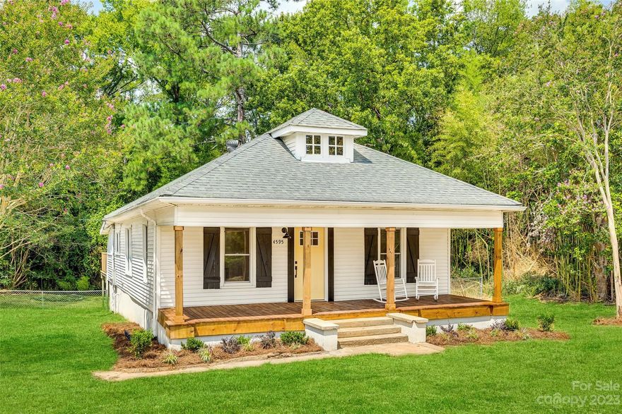 Vintage charm with brand new updates!   This cozy three bedroom home is filled with natural light and has been tremendously renovated.  You'll find new LVP flooring and paint throughout and brand new bathroom fixtures.  The living room is open to the kitchen for easy entertaining where you'll find new white shaker cabinets and gorgeous quartz countertops with brand new stainless appliances.  You'll love the welcoming front porch, large back deck, and the spacious acre lot with magnolia trees and the beautiful colors of Japanese maples.  You will have peace of mind with brand new HVAC, updated plumbing, and updated electrical.  Right in the heart of charming Edgemoor, you can enjoy peaceful country life, but still be a 15 minute drive from downtown Rock Hill and a quick ride to I-77.  This home is ready to welcome new owners.  Please note - grass has been photo enhanced in images as yard has recently been seeded.