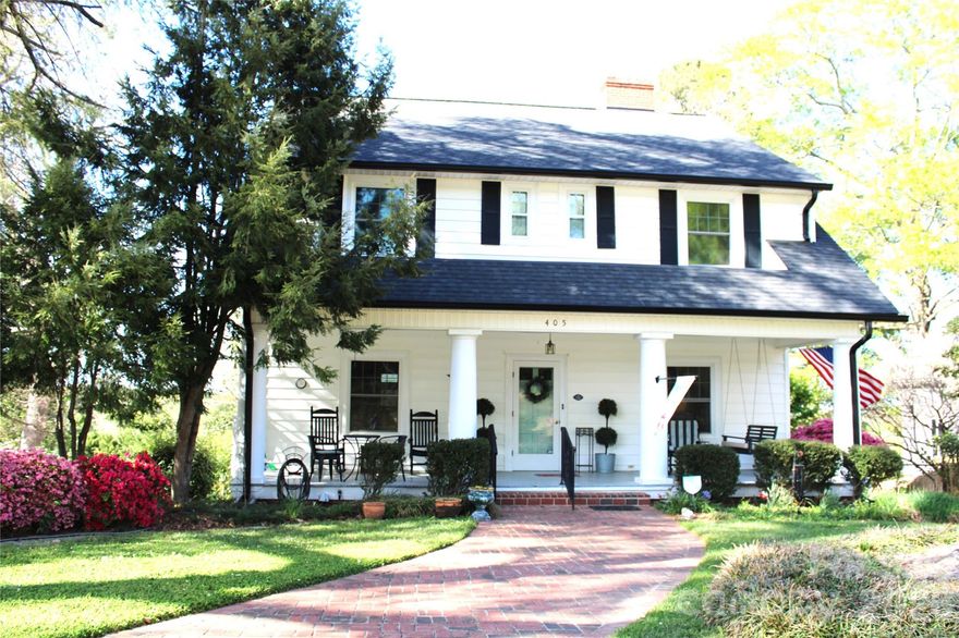 Discover this charming, historic home, nestled on 0.75 acres in uptown Wadesboro. This delightful two-story residence features an updated kitchen and 2-bathrooms while maintaining its historic character, including solid wood doors with original glass knobs on most doors, high ceilings, handcrafted molding, and a vintage telephone nook tucked away in the hallway. The home features three fireplaces with mantels and 1-inch hardwood floors throughout the family room, dining room, hallways and bedrooms; tiled bathrooms. The inviting family room features a cozy fireplace with gas logs and connects seamlessly to the dining room, making it perfect for entertaining. The kitchen is accented with solid surface countertops, sleek appliances, and a spacious sunroom ideal for casual dining or a breakfast area. The primary bedroom suite on the main floor includes a bathroom with a shower.  Two-inch wood window blinds.  You can unwind on the covered southern front porch in a rocking chair or relax on the deck to enjoy beautiful sunsets and the fenced-in backyard with an open area for gardening and pecan trees. The walkup and walkout basement has a large work area and 2 storage rooms. Best of all, you are in walking distance to uptown restaurants, beer garden, a library, shopping, and the Ansonia Theatre.  There are no HOA restrictions! Recent updates include a new roof and 6-inch gutters (2025), first-floor natural gas heating and air conditioning (2024), second-floor AC (2025), and a backyard fence (2024 and 2025).