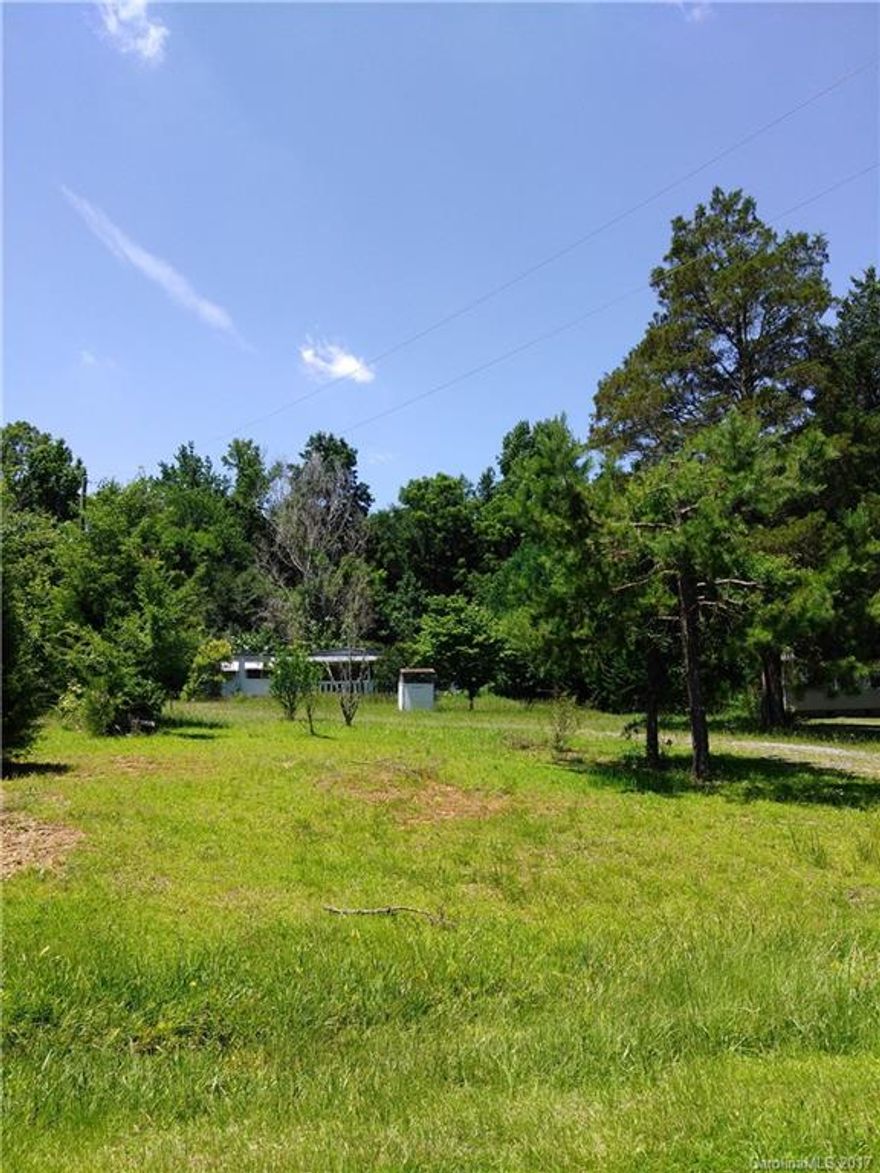 Great location and opportunity!  This property is being sold as "land" with approximately .67 acre lot.  Property includes "as is, at no extra value" a 1969 Walker 12x60  single wide manufactured home with electric and well, but needs a Septic (permit available).  Minutes from York Tech, Dave Lyle Blvd & Galleria Mall area.  Low county taxes!