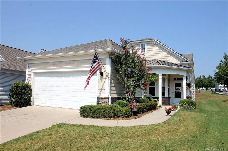 Popular Pine Spring w/ Sunroom & Patio on Corner Lot!  Freshly Painted and Brand New Carpeting Throughout Home! Great Location- Close Proximity to The Lake House, The Golf Clubhouse, & More! Foyer leads to Large Great Room & Formal Dining Area w/ Wainscoting. Kitchen w/ Stainless Steel Appliances, Hardwood Flooring, & Charming Breakfast Nook. Owner’s Suite features Private Bath w/ Dual Sinks, Shower, & Oversized Walk-In Closet. Office Provides Additional Living Space.