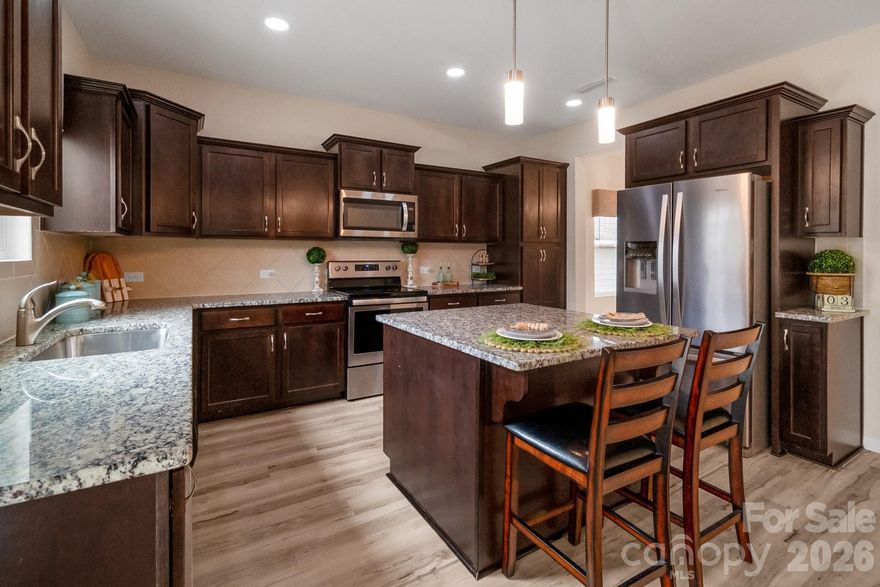 Welcome to 161 Old Harbor Drive, Mount Gilead, NC, located in the desirable Tillery Tradition community near beautiful Lake Tillery!

This better-than-new 4-bedroom home has been thoughtfully refreshed with fresh interior paint, all new upgraded luxury vinyl flooring throughout the main level, and updated light fixtures and ceiling fans in every room — giving it a clean, modern feel from the moment you walk in.

The open-concept kitchen overlooks a spacious living area and flows seamlessly to the back patio, creating the perfect layout for entertaining or everyday living. Step outside to enjoy a flat, fully fenced backyard — ideal for pets, play, or relaxing evenings.

Upstairs you’ll find generously sized secondary bedrooms plus a comfortable primary suite offering space and privacy. A covered rocking chair front porch adds charm, while the 2-car garage provides ample storage and convenience.

Perfectly located for recreation and leisure: only 2 minutes to the Lake Tillery public boat launch, 5 minutes to River Wild lakefront bar and restaurant, and 5 minutes to scenic Uwharrie National Forest hiking trails. With golf, the lake, and nature right at your doorstep, this home offers the ultimate lifestyle retreat.

Community amenities available @ Tillery Tradition include:
• Outdoor swimming pool
• Clubhouse
• Walking trails
• Playground
• Sidewalk-lined streets

Enjoy peaceful lake-area living while still being approximately 60–75 minutes to Charlotte, making it an easy weekend retreat or full-time residence with commuter access.

If you're looking for move-in ready, low-maintenance living near Lake Tillery with great neighborhood amenities — this is it.