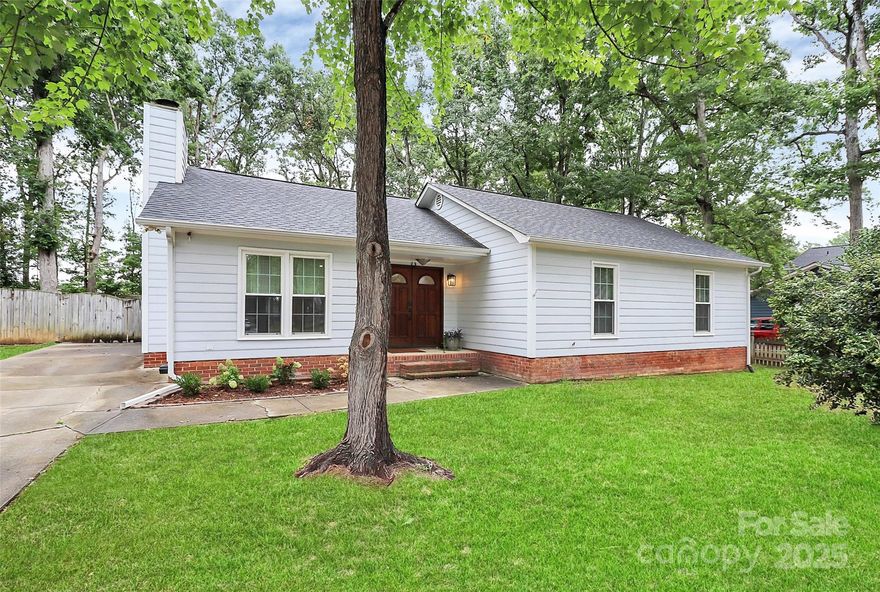 MUST SEE! You won't find a more beautifully decorated, well maintained and designed home at this price point. It is clear these home owners have loved modernizing this adorable home with both infrastructure and design features that reflect care and exquisite taste. Beautifully updated kitchen and baths. This home flows well with an open concept kitchen/den to a large screened-in porch perfect for relaxing.  Side entry off of driveway to mud room with laundry area. Flat, fenced yard is perfect for furry or human creatures great and small. Shows beautifully; lives high-end but at a realistic budget. This won't last long!