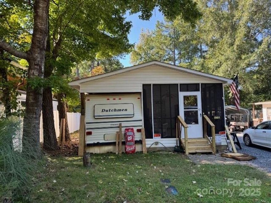New Listing 2 bedroom 3 bunks in 2nd bedroom, room addition offers a spacious living room, screen porch.  Storage building has power in back yard.  Furnished with appliances.