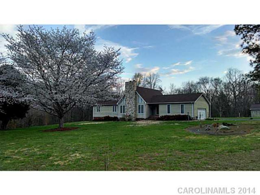 Wonderful country setting. Corner lot with creek boundary. Home features cathedral ceilings with loft & spiral staircase. Updated kitchen with new oak cabinetry. Spacious Master with whirlpool tub & stand-up shower. Basement features family room - currently used as bedroom, and a lrg fitness room. Unfinished portion has garage door & shop space.