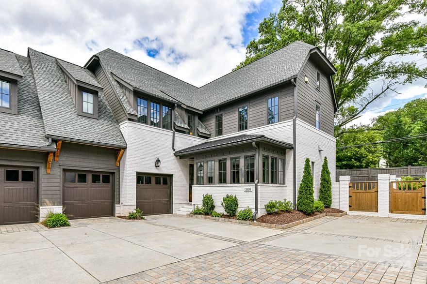 Nestled in coveted Myers Park near uptown, this modern European style abode WITH ELEVATOR epitomizes contemporary elegance, luxury and convenience. Sleek design, open floor plan provide an abundance of natural light. Gourmet kitchen boasts a large island, Thermador built-in refrigerator, premium appliances, quartz countertops and custom cabinetry. Glass doors open into a private porch with mobile screens creating seamless flow between indoor and outdoor living spaces. Outdoor kitchen features a built-in DCS gas grill and low maintenance turf. Upstairs Primary bedroom suite: spa-like bath with dual vanities, soaking tub, separate walk-in-shower, 2 custom walk-in closets. Generously-sized bedroom en-suites on the second level. Third floor features bedroom/bonus en-suite currently being used as a craft room and office. Storage galore. This fine location is within walking distance of sports arenas, museums and galleries, trendy dining spots. At every turn, enjoy unparalleled excellence!