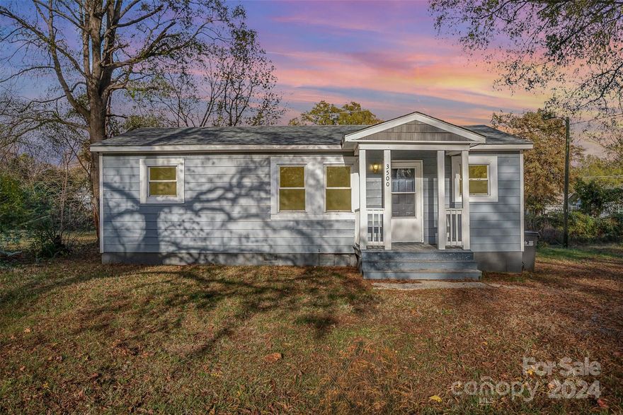 This move-in ready abode has been recently painted throughout and is awaiting new owners.  Stunning hardwood floors in living area and bedrooms.  Eat in kitchen with white cabinets and access to laundry/mud room.  Vinyl windows throughout.  Two bedrooms with office or den.  County records indicate 3 bedrooms, but third room does not have a closet.  New furnace, AC and roof.  Great starter home or addition to your rental portfolio.  No HOA!  Minutes to uptown, freeways and airport.  Schedule a showing and make this home yours today!