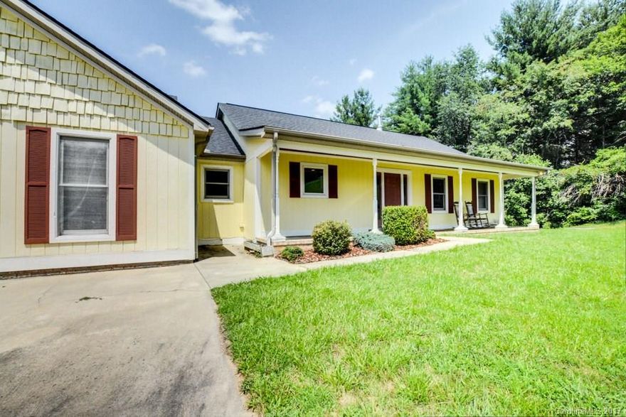 Lovely 3 BR/2 BA home in Weaverville. Cvd front porch. Kitchen w/lots of cabinets & counters. Nice wooded views through bay window & off rear porch. Spacious Master w/ large bath and walk-in closet. Large Master bath has double sinks, lots of storage, separate shower & tub. Split bedroom plan. Tray ceiling in living room. 2-car attached garage w/interior door to laundry. Private back yard. Large screened in porch w/access from living & master french doors.  Flu in place for wood stove.