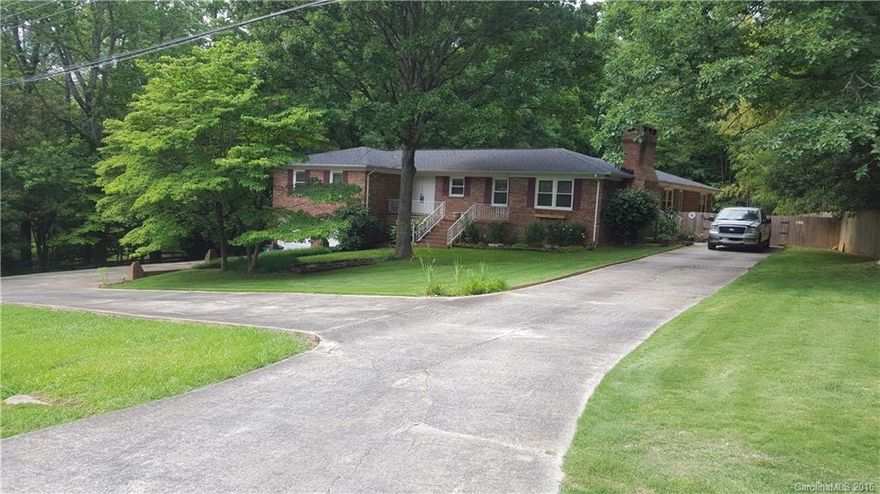 Remarkable solid built brick ranch in a terrific location! Many possibilities! Super new price below tax value. Mega sized basement and garage with heat and A/C. Split floor plan on one level with 2nd living area or master. Huge private rear deck overlooking fenced shady backyard. Circular drive and 2 driveways allow loads of off street parking. Recent roof, windows and HVAC. Propane powered back-up generator. Perfect for interior updating ideas. Outstanding value, won't last long at this price.