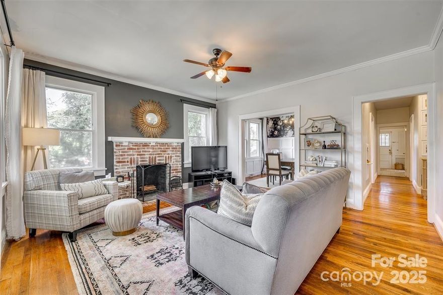 Welcome to this charming brick bungalow a delightful blend of vintage character and modern comfort. As you step inside you are greeted by the warm allure of the original hardwood floors and cozy wood-burning fireplace. The large dining room is a true highlight, featuring sticking board baton walls enhancing the charm. From the dining you will enter into the old butlers pantry now being used as a laundry room which flows into the kitchen. The spacious hallway leads you effortlessly through the home, showcasing its thoughtful layout and offering a sense of flow.