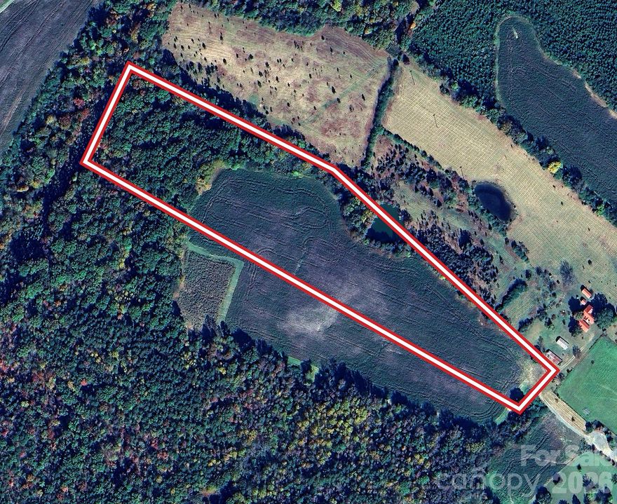 Discover 14 beautiful acres offering the perfect blend of open land in front and mature trees in the rear.   This peaceful rural property features a small pond, which is shared with adjoining owner, and plenty of space to enjoy nature, privacy, and quiet country living.  Ideal for homesite, recreational use, or a private retreat.  Land does have a septic permit for a 4 BR home, and is currently in the AG program. There is a 30 foot right of way through a portion of this tract for this and adjoining neighbor. Sugar Hill Lane, also called Road, is a private drive with a 45 ft public right of way of Flint Ridge Rd.