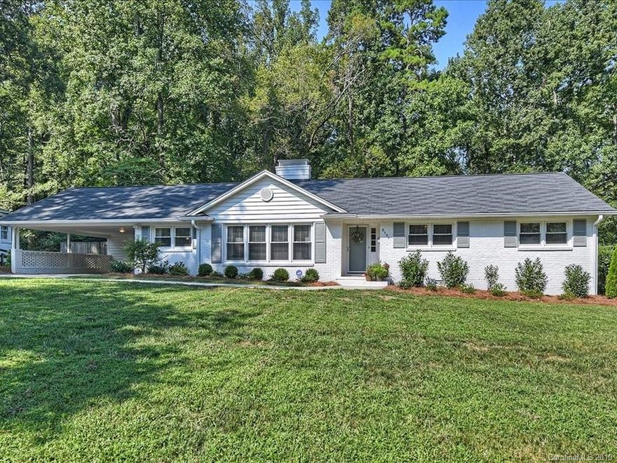 This beautiful white ranch in popular Sherwood Forest is truly move-in ready! The home features a smart floor plan with abundant living space and lots of natural light. The sunroom and den are both situated off the kitchen which allows for easy entertaining. The home sits on an over half acre flat lot. The fully fenced backyard features a paved patio perfect for a fire pit. The exterior (& majority of the interior) of home has been freshly painted and tasteful landscaping has been added to the front of the home creating incredible curb appeal! Neighborhood is well located and allows for easy access to restaurants and shops at Cotswold Shopping Center, Southpark, and Uptown.