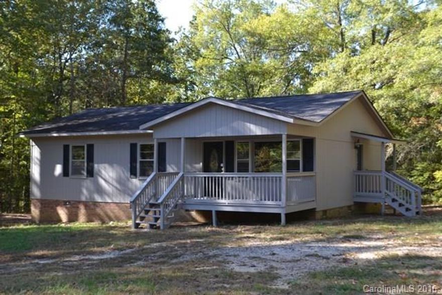 Cute as can be!  This home has all new carpet, new vinyl, updated bath, new front door and porch!  There are two bedrooms and one bath.  An office that could be used as a third bedroom using furniture as storage for clothes.  Large kitchen, eating and living area.