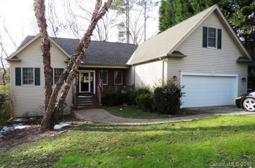 One-level living on the Tega Cay golf course! Spacious bedrooms w/ great open flr plan designed for easy living & entertaining. Fabulous covered porch + lg deck overlook the course & wooded privacy. Hdwd flrs in common areas, tile in baths & carpet in BRs. Huge crawl space could be nice workshop area or future expansion. One year home warranty provided for buyer @ closing. Home priced to sell & to be sold as is.