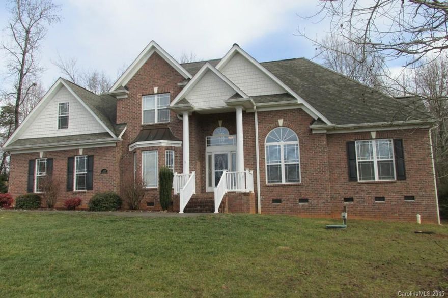 Owner Custom built home with boat launch at end of road subject to lake water level. May have trailered boat  on property in designated area. Master bedroom down, with great room cathedral ceiling and open floor plan. Easy access to Charlotte, I-77, shopping, restaurants, Lake Norman, and the Corp HQ's of Lowes and Ingersoll Rand. Home features 3 bedrooms, plus second floor bonus/bedroom, with walk in closet, and adjacent bath room.