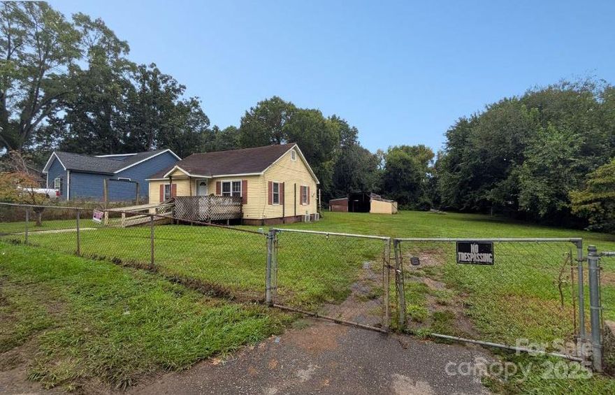 Full of potential and perfectly situated, this 2-bedroom home sits on a generous half acre lot. The incredible lot provides great possibilities, from gardening, outdoor living spaces or future growth. Inside, you’ll find a functional layout with all major systems in working order, giving you a solid starting point for updates or customization. The location is a true advantage, just minutes from I-77, making it easy to reach shopping, dining, and everyday conveniences. Whether you envision a rental property, a starter home, or a renovation project, this property offers a rare blend of opportunity, location, and lot size. Reach out now for your private tour!