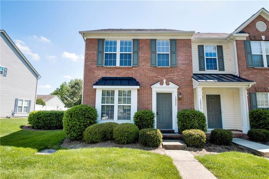 MOVE-IN READY!  Very clean 2b/2.5b end unit w/tons of natural light. Dining, kitchen & family room flow together in this open floor plan. Lots of living space. BRAND NEW laminate flooring throughout the main level, carpet upstairs and fresh paint throughout! Two large bedrooms w/ ample closet space upstairs. Fenced backyard great for entertaining. Next door to pool community pool!! 1-car garage. Minutes from I-77, business, retail & restaurants. This one won't last long!