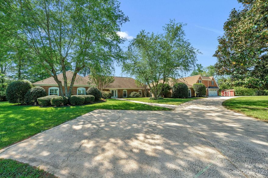 Welcome to this Stunning Weddington Equestrian Estate nestled on 6+ private acres w fenced in pastures, 4 stable horse barn & Award Winning Weddington Schools! Stately full brick ranch boasts a heated salt water pool, pool/guesthouse w sauna, kitchen, bonus room, rec room & 4 car garage. Gorgeous Views, Natural light & Abundance of space throughout main house. Open Concept layout ideal for every day living & entertaining. Inviting entry opens to large executive office & formal DR. Living/Sitting Rm w fireplace, large eat in chefs kitchen w granite countertops, large center island/breakfast bar, range hood & huge walk in pantry w counters. Expansive Great Room w wall of windows, vaulted ceilings & 2nd fireplace. Escape to elegant primary w tray ceilings, ensuite w jetted tub, shower, dual vanities & large walk in closet. 2nd master w full bathroom & walk in closet, 2 additional secondary bdrms, bonus/exercise rm, den & laundry. Incredible Outdoor living w covered patio/ pool/fire pit!