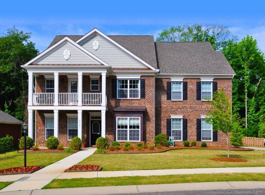 Stunning Full Brick Stately Home with 3-car garage and double front porches on an expansive 1.3 acre lot. Lovely Lake Wylie neighborhood with rolling land and winding streets.  This brand new home features hardwood floors, including the stairs; quartz countertops, Butler's pantry, main floor study with french doors, and a large walkin pantry. Guest suite on main, huge bonus with walkin closet, deluxe Owner's Suite with huge walkin closet and lovely bath. Large back Deck & 2 Front Porches. Enjoy!