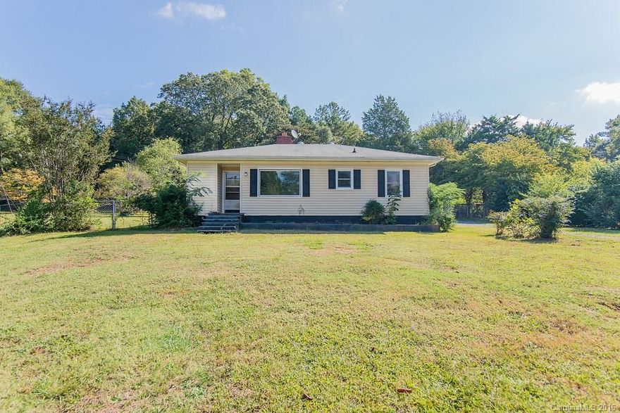 If you want  quiet country living with almost 3 acres, this is the home for you! Cute, quaint home that sits off the road for a hard to find private lot! Home boasts original hardwood floors, a fenced in back yard and a large workshop. Owners also willing to leave all appliances including washer/ dryer and stainless refrigerator!