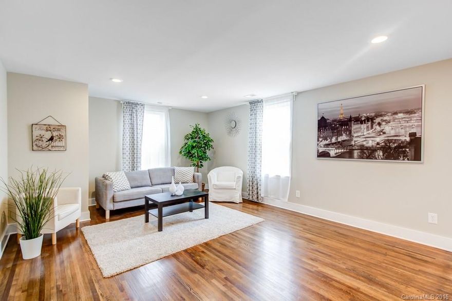 Imagine living in a historic home within uptown that has been fully updated, has 3 full bedrooms, views of uptown from the living room, kitchen and bedrooms, has HOA dues of just $75/month, ample parking and is under $260k! And yes, that includes all new appliances! Updates include: New tile, backsplash, faucets, customer master shower, LED lighting, bedroom fans, granite & sinks in baths, refinished hardwoods, solid core doors, master closet storage system, shower heads, appliances, & much more