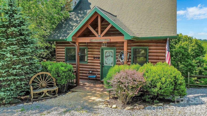 TIS THE SEASON FOR GIFTS! Why Not Splurge on Something You Can Personally Enjoy for Years to Come? Imagine Finding Yourself Snuggled Up by the Fireplace with the Beautiful Glow of Christmas All Around You as the Peace and Tranquility of the Mountains Fill the Air? This Beautiful Cabin is Ready for a Quick Close and Can Make Your Christmas Dreams Come True this Year! Turn-Key Mountain Living & It's VRBO Ready for Those Seeking an Investment Property! This Beautifully Furnished Cabin in Much Desired Deerwood Park in Piney Creek is Ready & Waiting for You! Just Bring Your Clothes! From Pots and Pans to Sheets and Towels, Everything is Included! Mountain Charm Exudes on the Main Floor w/Hardwood Floors, Tongue and Groove, Granite Countertops, Cozy Wood Burning Fireplace and Beautifully Decorated w/Fine Cabin Style Furniture & Decor. Living Room, Kitchen, Dining and Half Bath on Main. Upstairs, the Mountain Charm Continues in the Primary Bedroom w/King Size Bed, Private Balcony and Full Bath. Lower Level Provides a Family Room w/Queen Size Sleeper Sofa, Bedroom w/Twin Beds Providing Access to Lower Level Pavilion Area, Full Bath and Laundry Room! Wrap Around Deck is Accessed from Main Level While the Highlight of this Cabin is the Beautifully Covered & Spacious Pavilion Accessed from the Lower Deck Providing Ample Room for Grilling, Dining, Relaxing in the Hammock, Reading a Book or Playing Games! Oh, and Don't Forget it's Perfect for Stargazing, Enjoying the Wildlife Meandering Around the Property or Just to Enjoy Your Morning Coffee or Evening Beverage of Choice! With Two Parking Spaces at Main Entry and Additional Parking on the Lower Driveway, There’s Plenty of Room for Family & Guests. Deerwood Park Is a Golf Cart-Friendly Community Offering Plenty of Areas to Enjoy the Beautiful Scenery and Wildlife, Along w/Multiple Ponds, Common Areas and Access to a Private Path Across the New River State Park Leading to the River. Just A Short Stroll or Cart Ride Away, The Red Dog Bistro Adds a Local Dining Option Close to Home. This Cabin is a Short Drive to the Jeffersons, New River State Park, Grayson Highlands and the Creeper Trail! Schedule Your Tour Today - Your Mountain Escape in the Beautiful Blue Ridge Mountains of Alleghany County Is Ready for You!