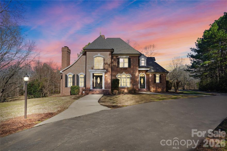 This Stately Cabarrus County Home sits on over 4 acres less than 5 miles from I-85, and the shopping and dining of Afton Village! Tucked away in a Cul-de-Sac in Rarely Available Dove Field, this full brick home has it all. The updated kitchen boasts a Jenn Air gas cooktop and electric wall oven, gorgeous granite countertops, and huge double door stainless steel fridge. Sit and eat in the Formal Dining Room, Relax in the Great Room by the Fireplace with a view of the woods in back, or enjoy time in the office / formal living Room. High quality hardwood floors are throughout the main floor. The Primary Bedroom is on the main, and has a spacious walk in closet. The Primary Bath has dual vanities, tile shower, and Whirlpool tub. Upstairs is a large second Primary Suite, and two additional bedrooms connected by a Jack and Jill bath. In the basement you will find a bedroom and a full bath, along with a Rec room, a family Room, a flex-room, for storage, a hobbyist, or exercise room. Along with room in the basement, two walk in attics, and an attic above second floor with pull down stairs, there is TONS of storage space!  Out back is an in-ground pool that was just resurfaced and has a brand new pump! With much of the 4.8 acres cleared, there is room for recreation, gardening and more! With a fresh coat of paint and brand new carpet throughout, this home is MOVE-IN-READY and waiting for you!