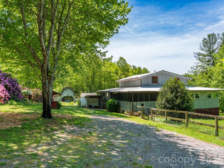 This NC mountain home, in the heart of Hidden Valley, is the perfect place to put down roots for your family homestead. With a memorable mountain cabin surrounded by 1.4-acres of flat yard and a fenced in pasture featuring a beautiful vintage barn, you'll have plenty of room for your family, your animals and your garden to grow! With solid bones and a highly desirable setting -- including deeded recreational access to the communal Hidden Valley pond -- it's ready for you to live the cottagecore country life you've been dreaming of! 

This property also presents a prime opportunity for those looking to renovate, flip, or create a custom mountain retreat. The land is a standout feature—fully fenced pastures offer flexibility, while the vintage barn adds character and potential for restoration, storage, or creative repurposing. And if you're looking to modernize the existing structure and maximize value with a full remodel, the possibilities for a profitable flip here are wild! 

Located at 3,220' in elevation in a peaceful, scenic subdivision surrounded by family farms and large tracts of conservation land. With easy access to nearby amenities in Waynesville, Canton and Asheville as well as the Great Smoky Mountains National Park and Pisgah National Forest this property is the ideal location to bring your vision to the mountains and unlock the potential this property has to offer!

Home is being sold as-is. Upper level features an additional 696 sq/ft of living area which was not counted toward total since it is indirectly heated from wood stove and heater on first level. Pre-listing inspection is available and seller is offering a $5,000 credit with acceptable offers to help jump start your renovations!
