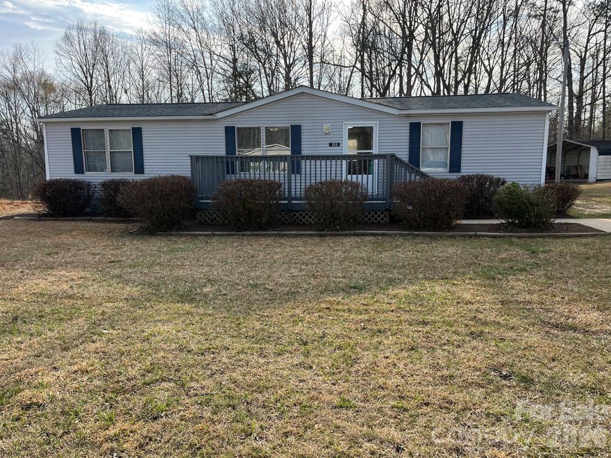 Clean, comfortable, and beautifully remodeled doublewide mobile home showcasing tile flooring in the kitchen and bathrooms, complemented by sleek stainless steel appliances. Thoughtfully updated, this home offers a fresh, modern feel with attractive low-maintenance finishes throughout.

Ideally located near Interstate 40 and Lake James, you’ll enjoy the convenience of community water and sewer, paved roads, and an easy-care lifestyle designed for low maintenance living. Whether you're looking for a primary residence or a smart investment opportunity, this home delivers comfort, convenience, and value in a desirable location.