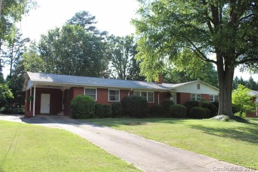 Amazing buy on a ready-to-move-in brick home with 4 bedrooms and 2 baths. Great location convenient to everything. Lovely hardwood floors throughout most of the home. Spacious master bedroom has a private bath with dual sinks. The living room and dining room are open. The fourth bedroom could also serve as a formal dining room or as a home office. The carpeted den provides another area for entertaining. Drive right up under the carport to access the home.