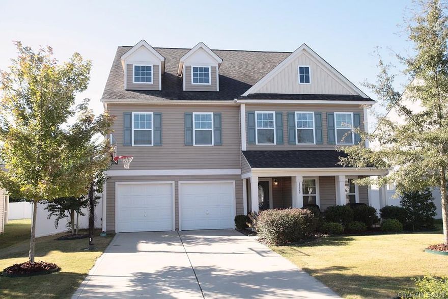 Home theater!  New Acacia hardwood flooring!  Upgraded lighting!  Refrigerator!  Washer/Dryer! New hot water heater! 
The spacious, open-floor plan home also boasts three levels of which seven rooms could all be considered bedrooms.  Bedroom/office on the main.  Four bedrooms on 2nd floor.  Theater + bedroom and full bath on 3rd floor.  Close proximity to I-77 for the uptown commuters.  Award winning schools.  Low taxes. Highly desired neighborhood.