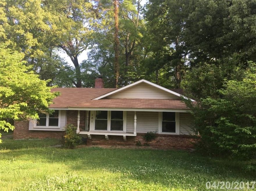 Brick ranch in fantastic location at an affordable price is this 3 bedroom home. Property features mason fireplace, spacious rooms and massive kitchen.  Enjoy the proximity of great shopping!  Property is exempt from NC property disclosures. See agent for further details.