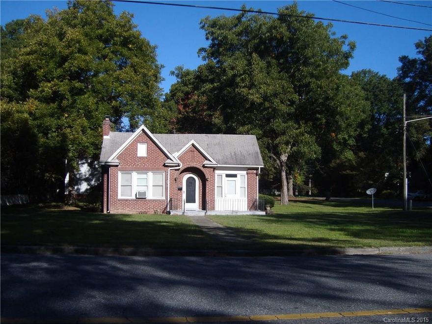 Brick home on corner lot, detached garage building in rear, proof of funds required with all offers