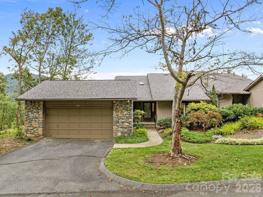Come experience this spacious, light-filled home, quietly nestled in a private corner of the highly sought-after, gated Beaverdam Run community in North Asheville. From the moment you arrive, you’ll be captivated by the panoramic mountain views that other homes may have promised—but couldn’t deliver. Generously sized rooms with a neutral palette create a serene and welcoming atmosphere throughout. The lower level offers guests their own private retreat, enhancing the sense of comfort and seclusion. Step outside to enjoy thoughtfully designed outdoor spaces—perfect for relaxing, hosting barbecues, or entertaining—all while taking in the stunning vistas that define this unique property. Over time, you’ll find yourself inspired to personalize the home to reflect your taste and lifestyle. Living here feels like residing on your own private estate, blissfully removed from the noise of the modern world. As a resident of Beaverdam Run, you’ll enjoy access to 115 acres of beautifully maintained grounds, a large heated indoor pool, tennis and pickleball courts, sauna, fitness center, and a clubhouse offering a full calendar of social events. Be sure to explore the historic on-site cabin as well. It has a ping-pong table, billiards table and a sweet library. Monthly fees cover exterior home/roof maintenance, road upkeep, and all common area amenities—making this an easy, worry-free place to call home. This property is easy to show—contact your agent today to schedule a private tour!  Mortgage savings may be available for buyers of this listing.