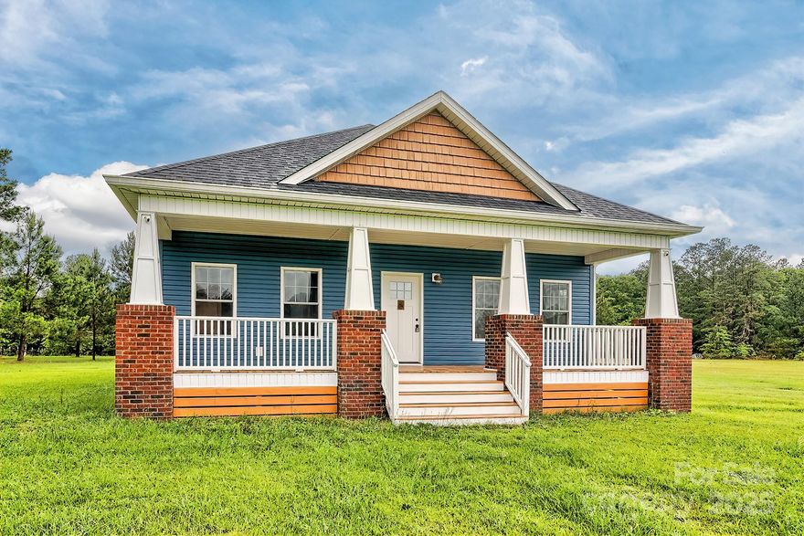 Gorgeous Custom Built Home only 3 1/2 years old. Situated on TWO ACRES only 3 minutes from Down Town Kershaw.3 spacious bedrooms and 2 full baths.This home is in immaculate condition and move in ready. Custom built cabinets with butcher block counter tops, luxury vinyl flooring, brick fireplace with gas logs, coffered ceilings in family room, and so much more!  This is a must see. Both bathrooms are beautiful with tiled flooring. Master has a walk in tiled shower and a double vanity. Beautiful lighting fixtures add to the character of this well designed home. Screened in back porch for relaxing. Come see it! You'll be glad you did.